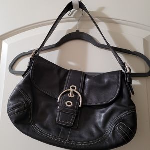 Coach handbag with buckle